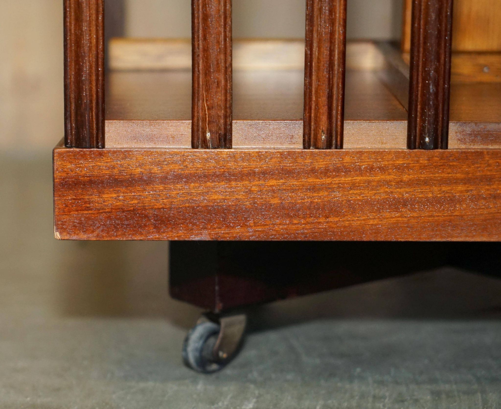 Sheraton Revival rotating library table in walnut and satin wood.