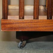 Sheraton Revival rotating library table in walnut and satin wood.
