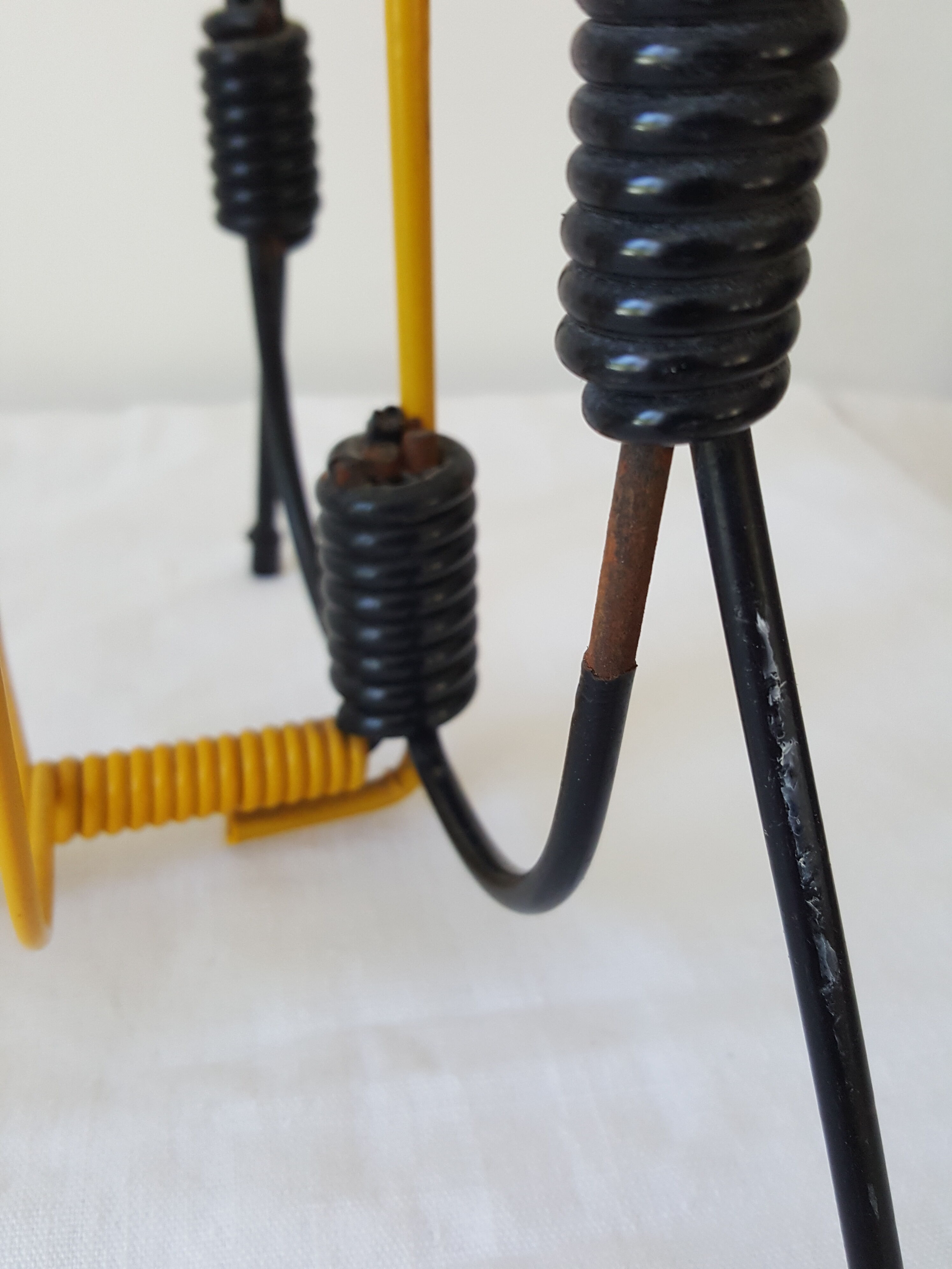 Black and yellow metal magazine holder 70s