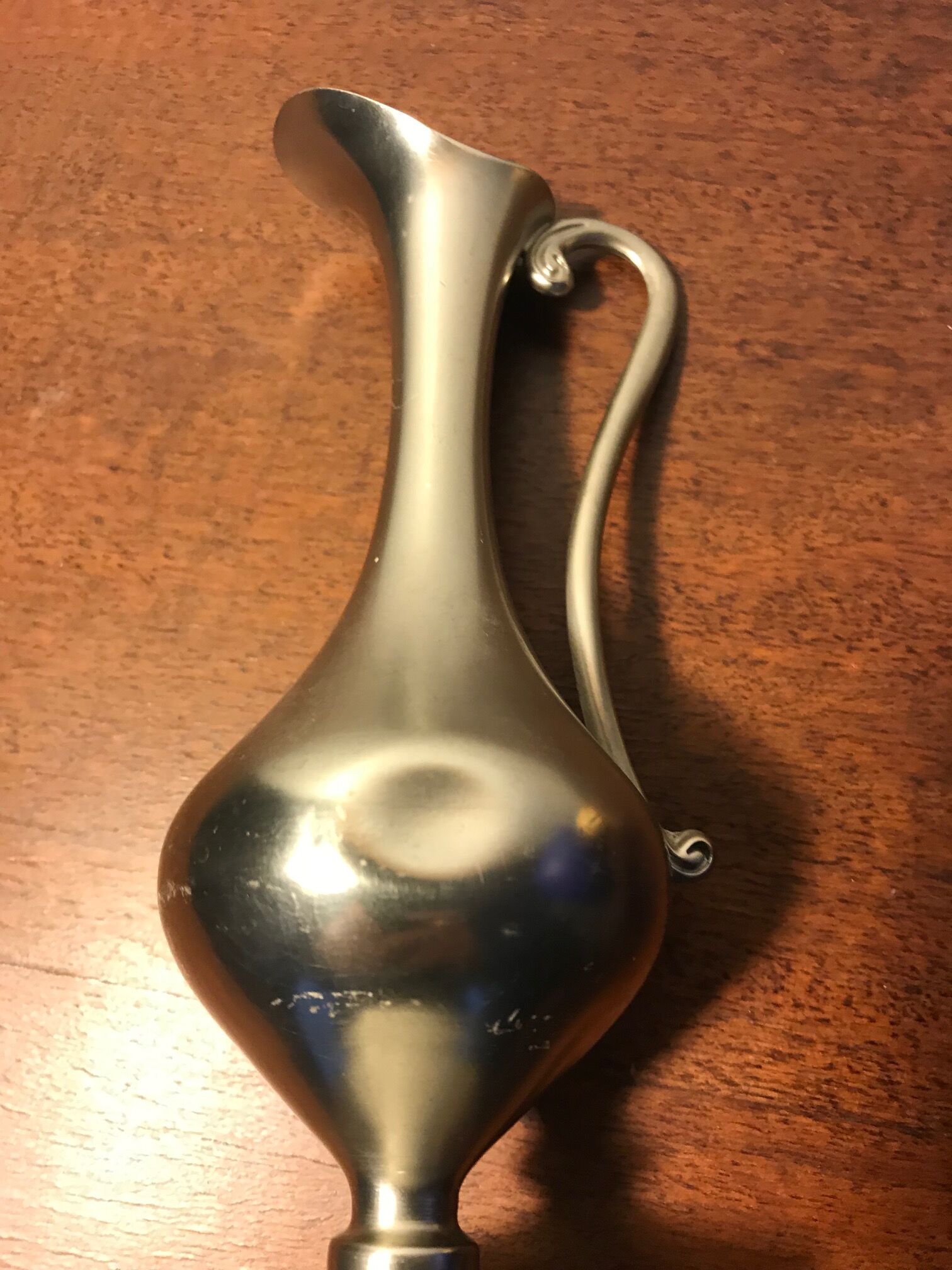 Tin pitcher