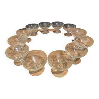 Suite of 12 champagne glasses in cut glass with floral decoration