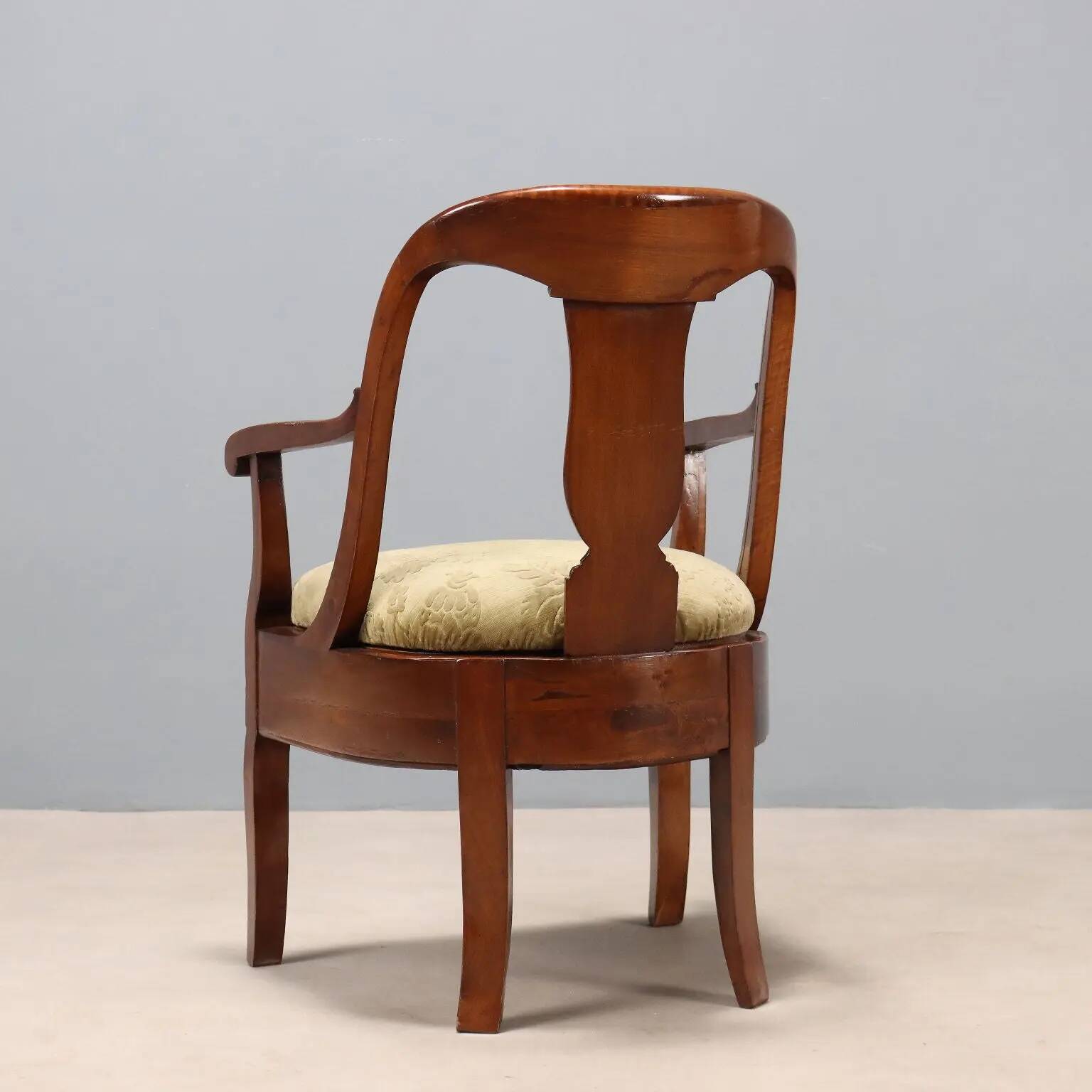 Antique Charles X armchair in walnut and fabric, Italy, mid-19th century.