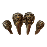 4 lion coat hooks in brass