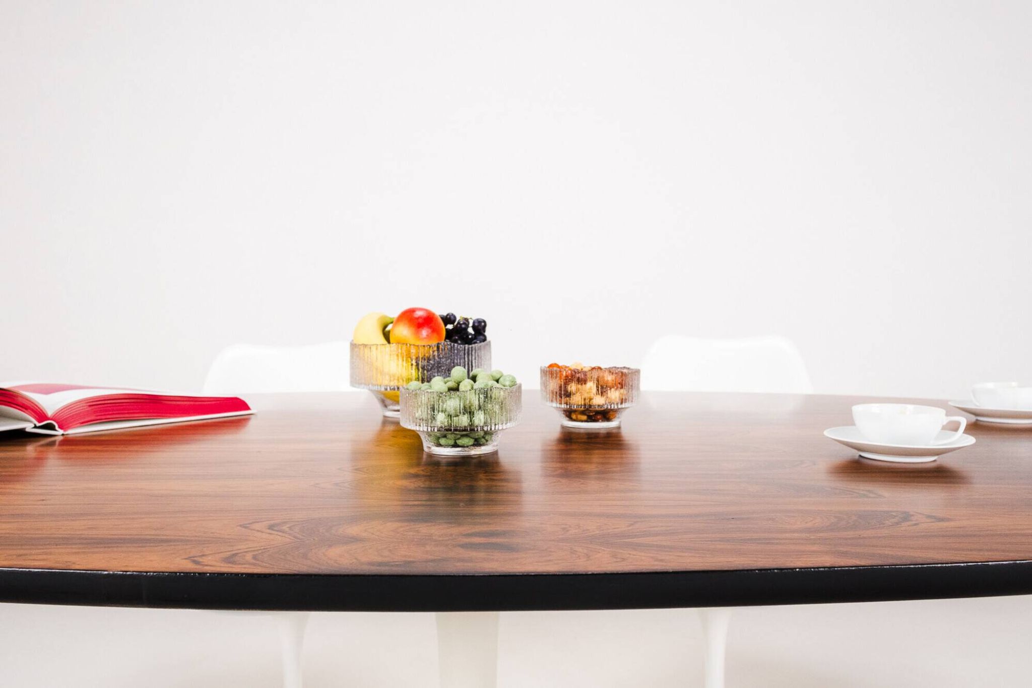 Oval dining table in rosewood by Maurice Burke for Arkana, England, 1960s