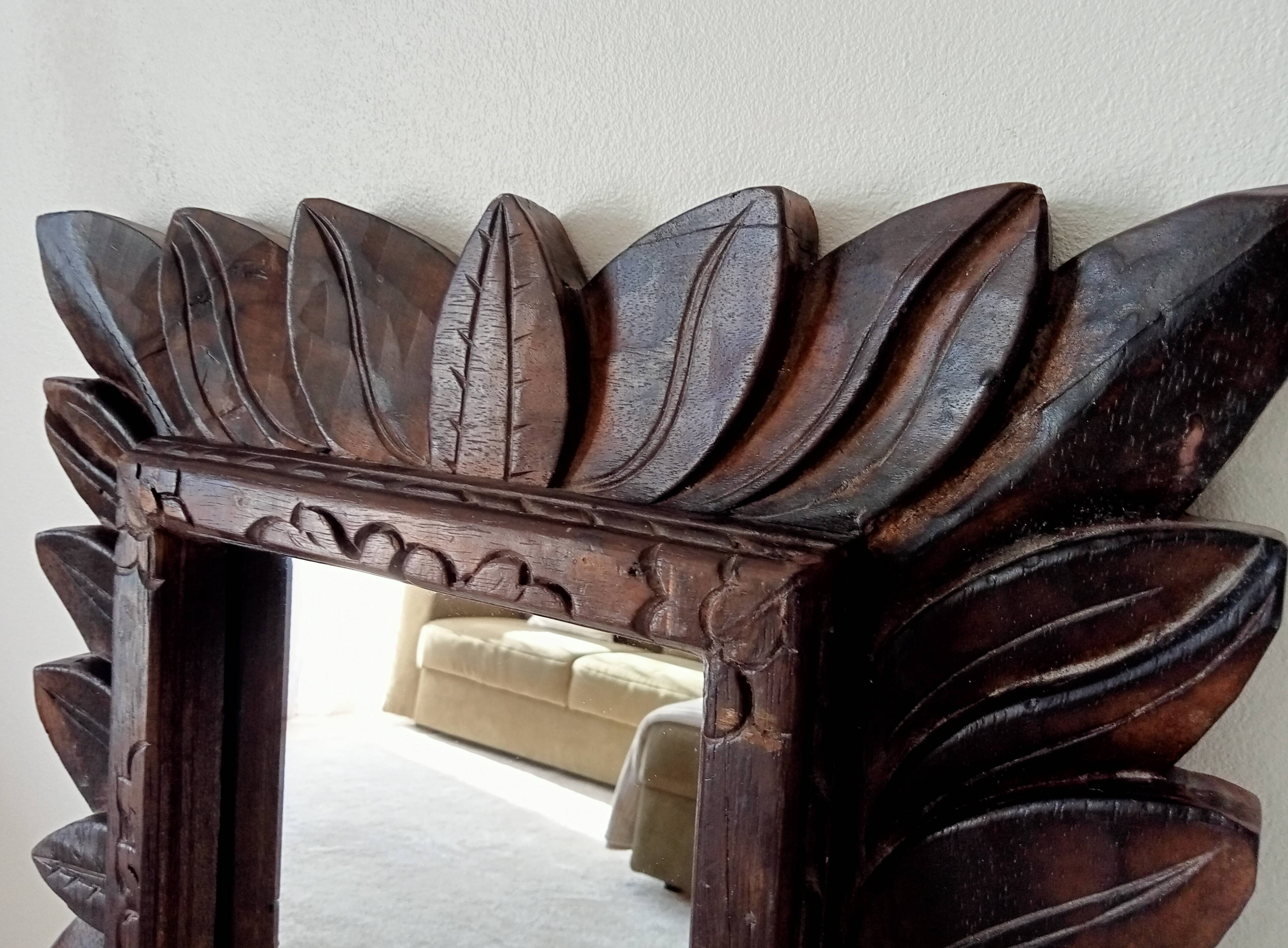 Antique mirror in carved wood