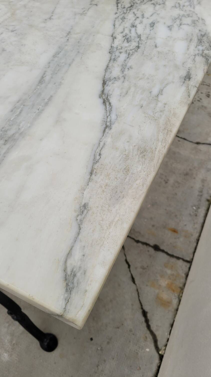Marble and cast iron restaurant bistro table