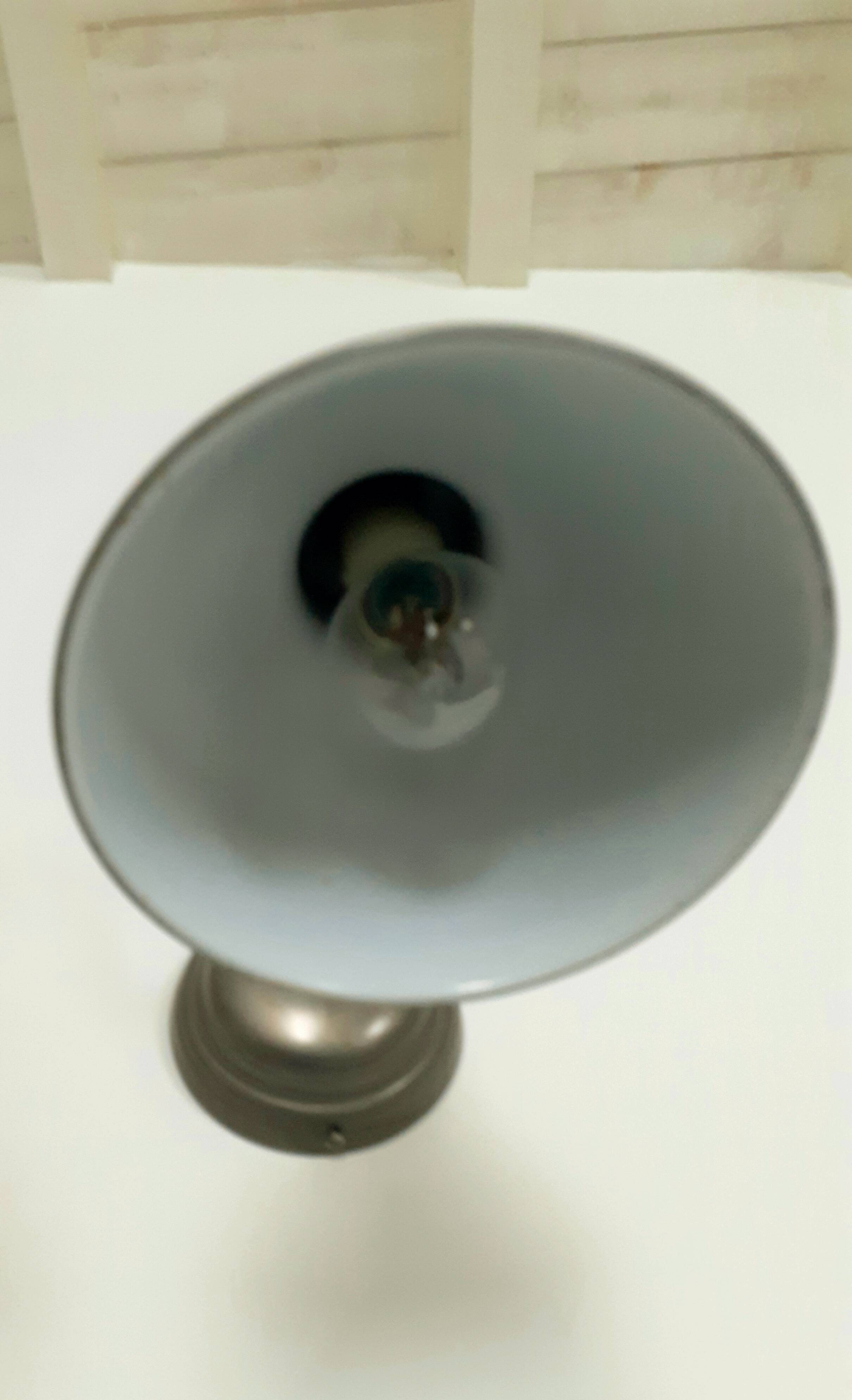 Metal wall lamp in industrial style