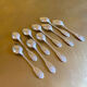 Series of 9 silver metal dessert spoons, Boulenger