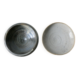 2 enameled stoneware cups, one of which is signed