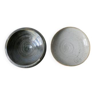 2 enameled stoneware cups, one of which is signed