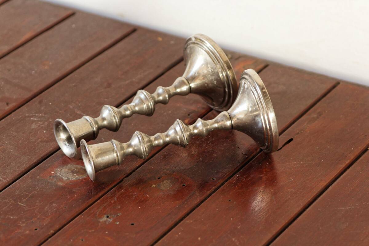 Pair of silver metal candlesticks