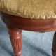 Upholstered stool on casters