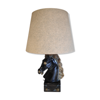 Plaster horse head lamp and blue grey blind