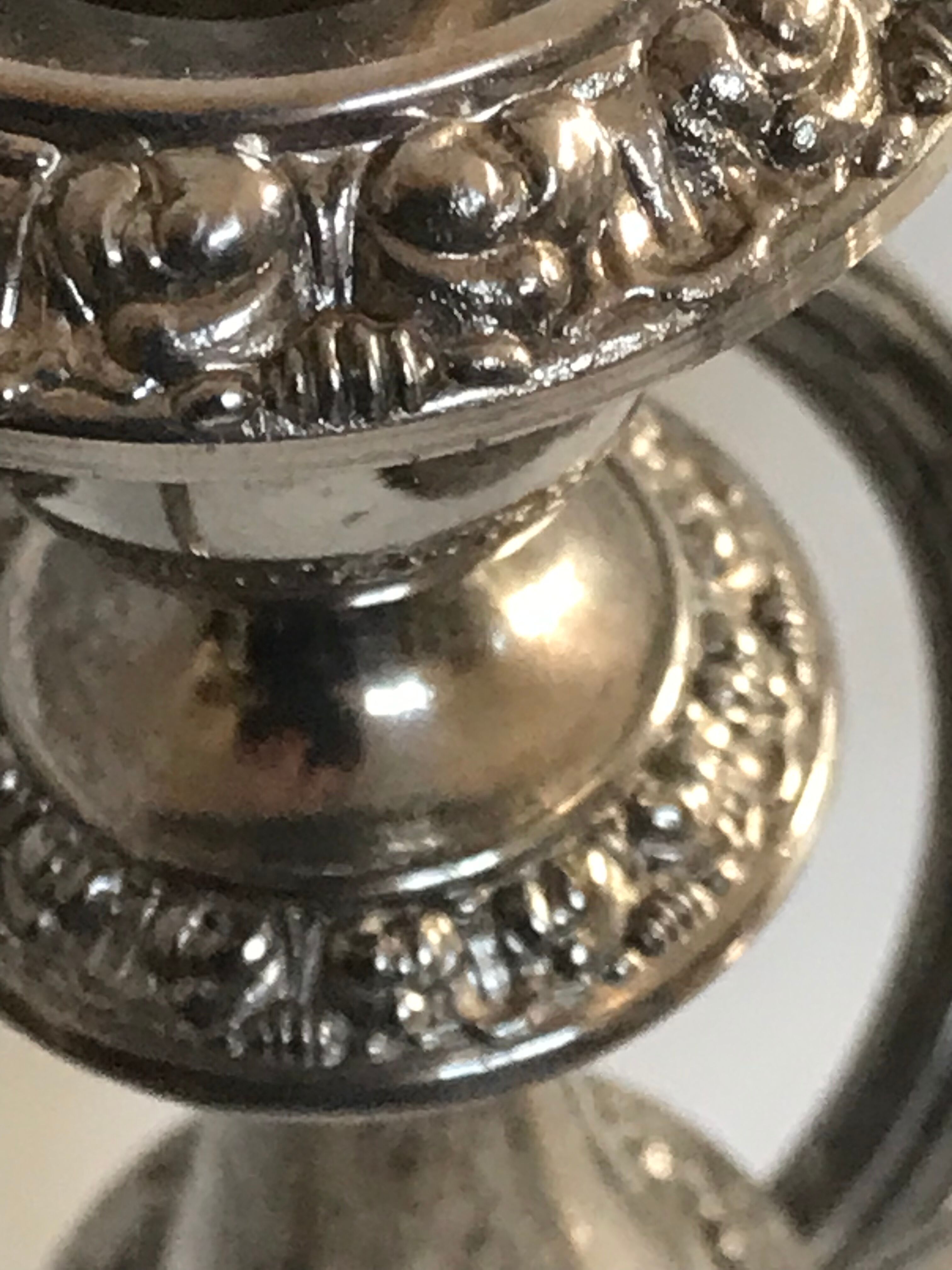 Pair of silver metal chandeliers