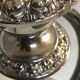 Pair of silver metal chandeliers