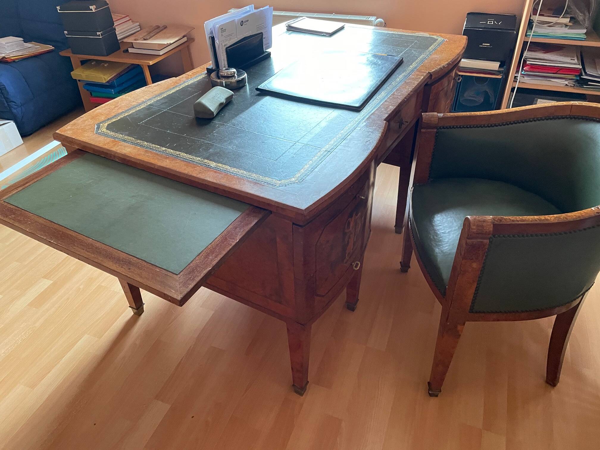 Antique Empire-style desk in burr veneer, green leather, with a dash.