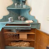 Patinated corner dresser