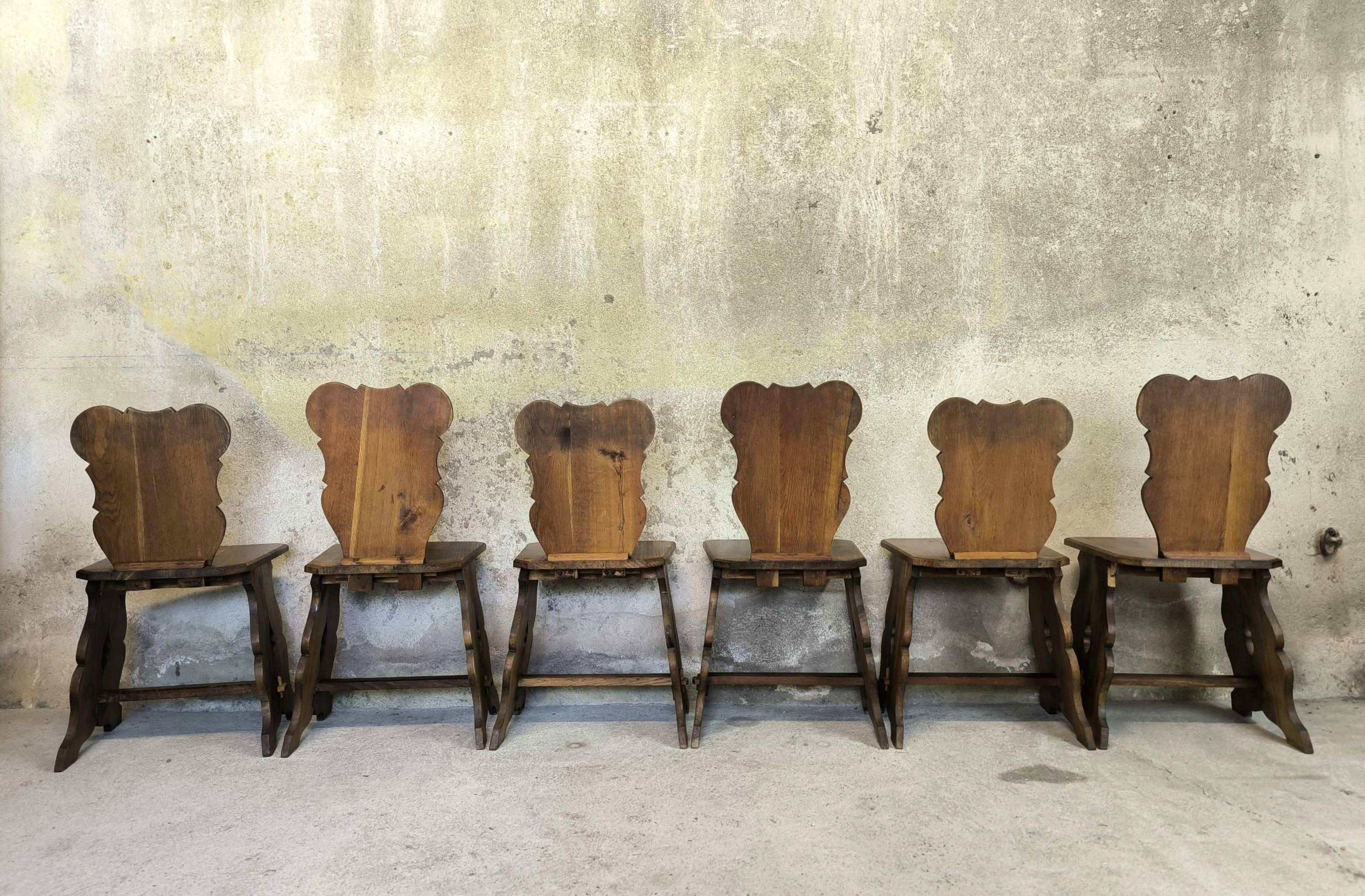 Set of six vintage brutalist wooden chairs.