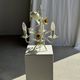 Small vintage cream metal flower chandelier with orange flowers and 3 arms.