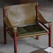Arne Norell, Pair of "Sirocco" Safari armchairs in ash and green leather, 1960s.