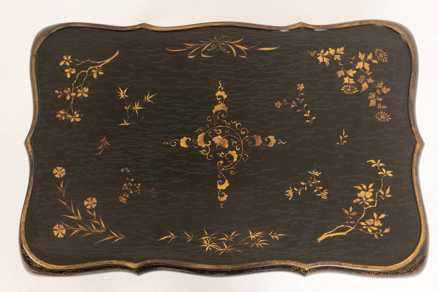 Coffee table with removable top in red and black lacquered wood. 1950s.