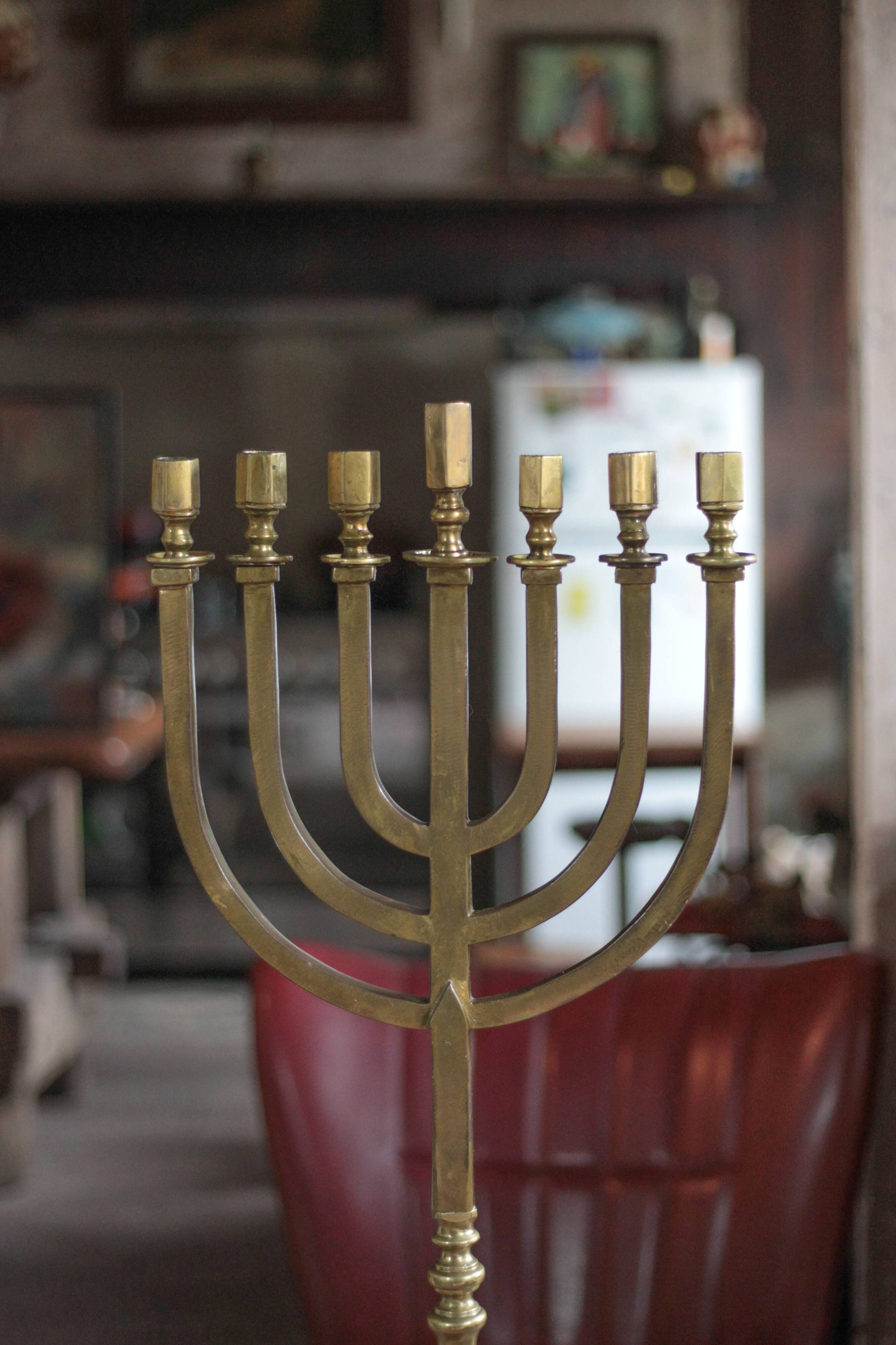Golden bronze chandelier with seven arms, Menorah, candlestick on a stand, candelabrum.