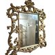 Gold wooden wall mirror with floral decoration