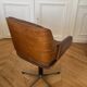 Vintage swivel chair in wood and leather