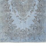 Mid-20th century hand-knotted turkish rug over-dyed in light blue. tek0394