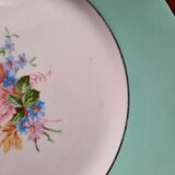 Pitted old flat earthenware plates with gold