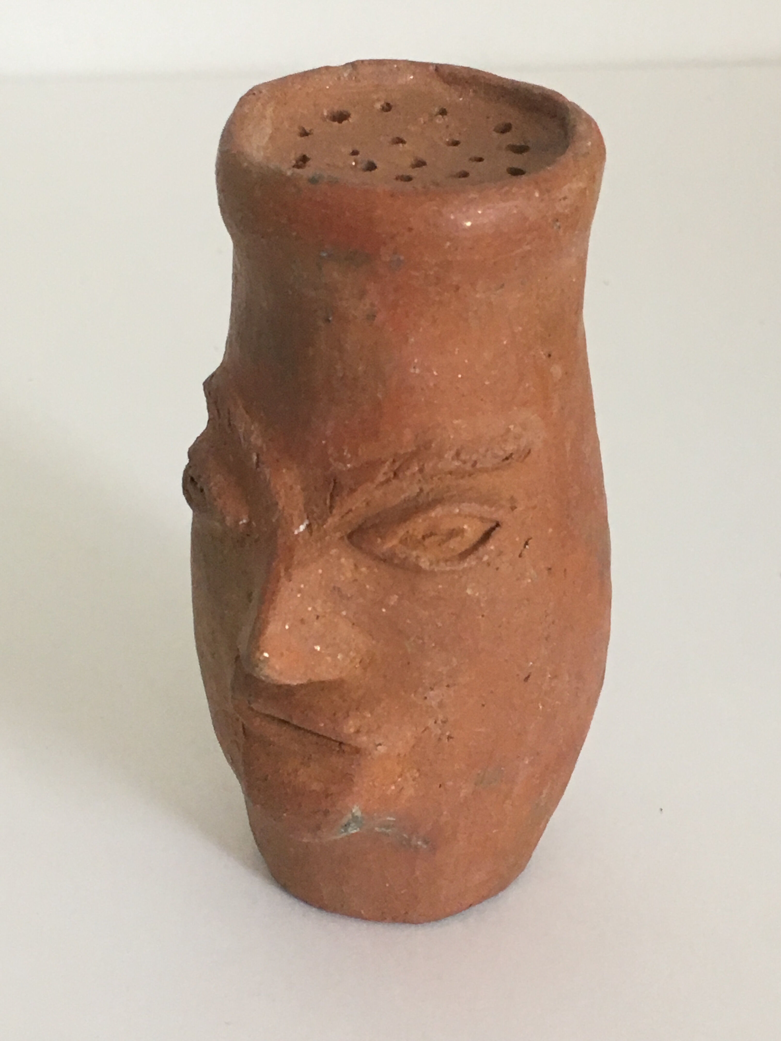 Artisanal terracotta terracotta salt shaker character head sculpture