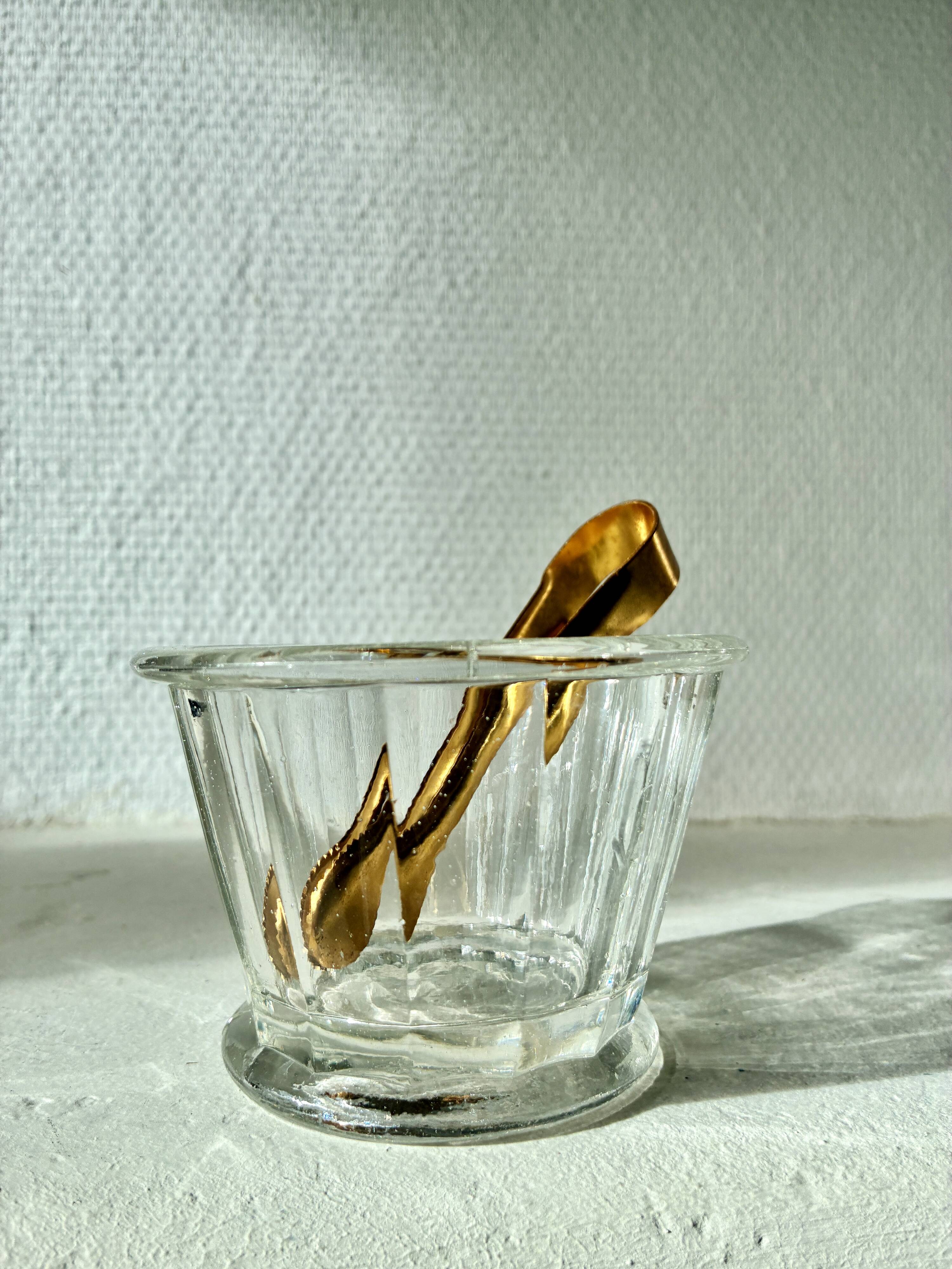 Antique faceted glass sugar bowl