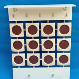 White wall coat rack from the 60s-70s