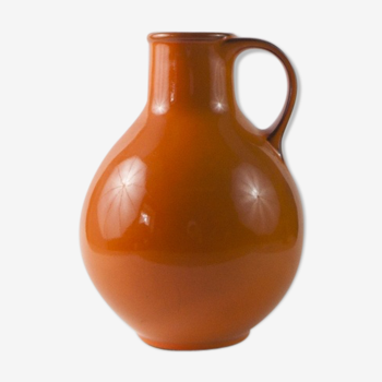 Orange vase with handle