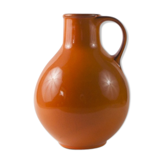 Orange vase with handle