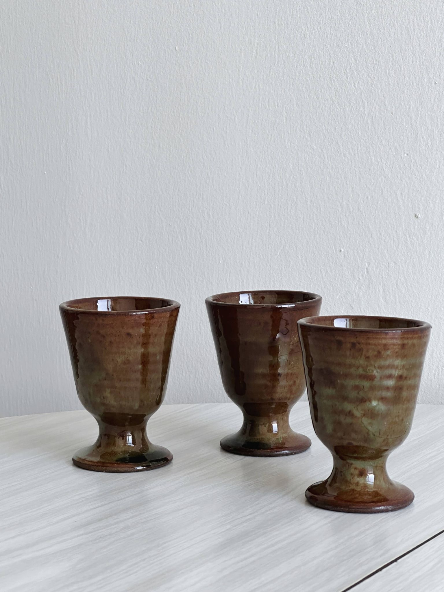 Set of 3 small enamelled ceramic mugs