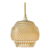 Suspension in iridescent molded glass