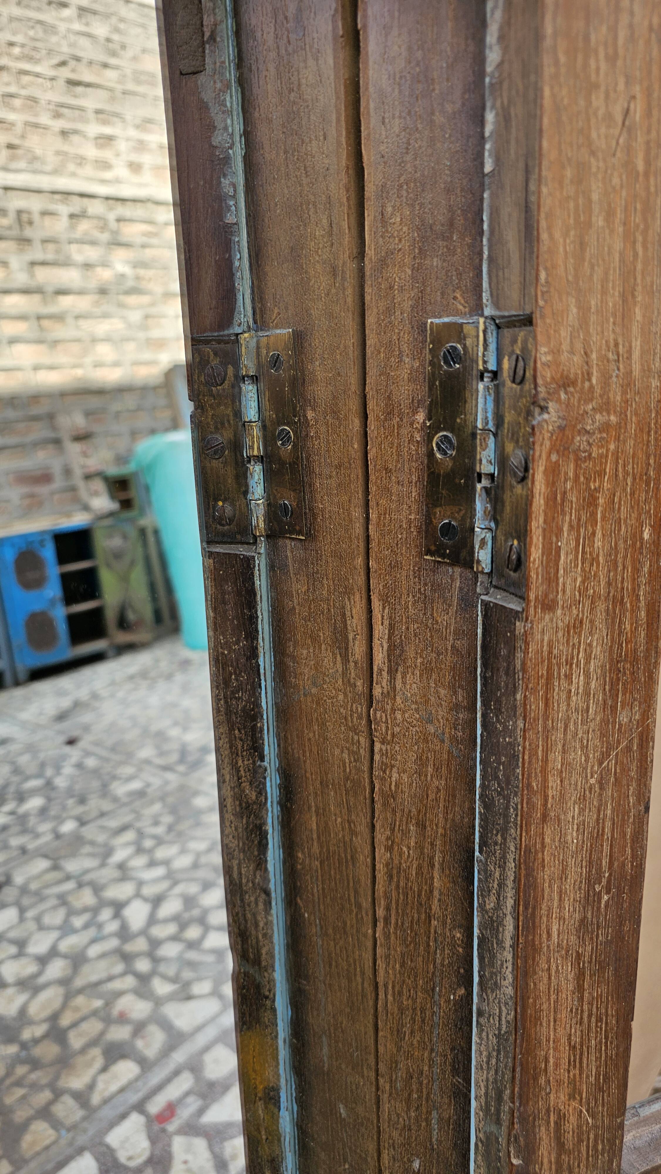 Art Deco mirror in Burmese teak