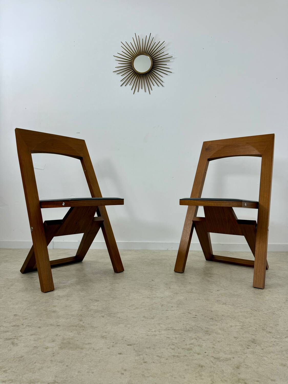 2 old folding chairs in wood and leather, postmodern design from the 80s vintage