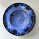 Plat creux bleu indigo signé