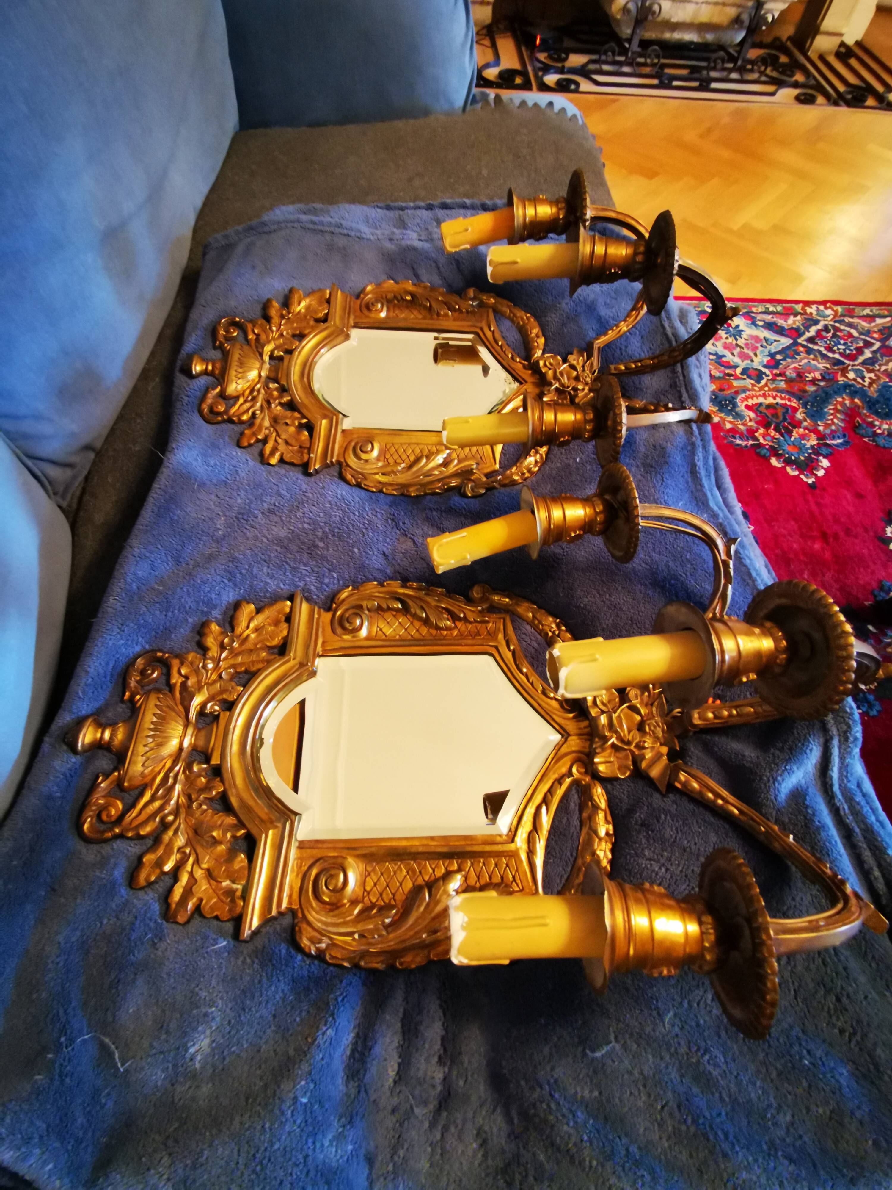 Pair of chissed and gilded bronze mirrors forming appliques