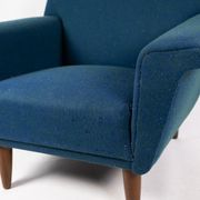 Armchair upholstered with dark blue wool fabric and legs in dark wood, of danish design, 1960s