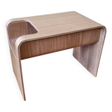 Boone coffee table in curved wood produced by Habitat, design