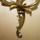 Pair of antique French wall sconces, gilded and bronzed, from the 1920s.