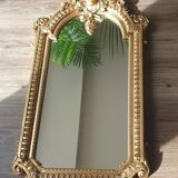 Gilded mirror signed Vincenzo Fancelli