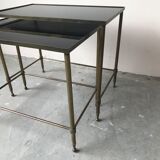 Pull-out tables in glass and brass