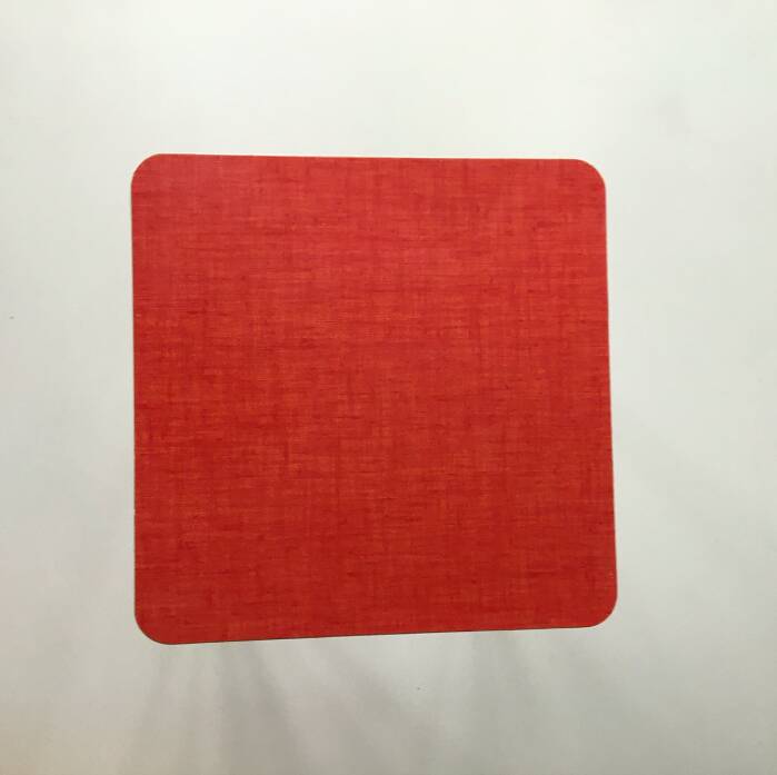 Stool in pinkish red formica