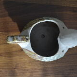 Cache pot canard
