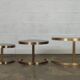 Superb trundle table round golden and smoked glass