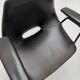 Paire de fauteuils modèle Tonneau, en skaï noir par Pierre Guariche, années 60
